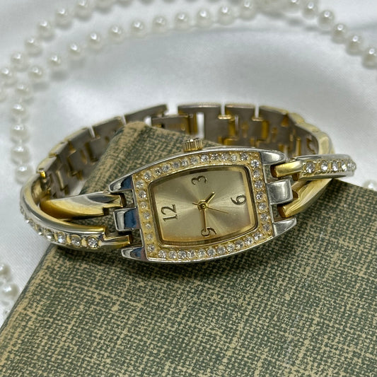 Vintage gold and silver tone diamanté watch with rectangle dial and crossed cuff style band.