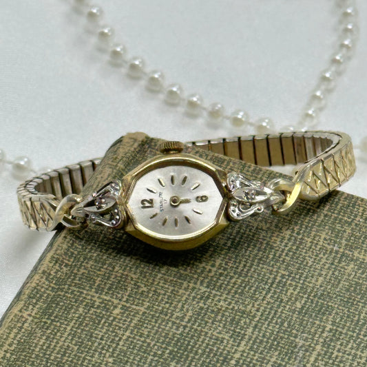 Vintage gold tone diamanté manual winding Starlite watch. Watch is missing minute hand and crystal. Back is engraved with "Gerry".