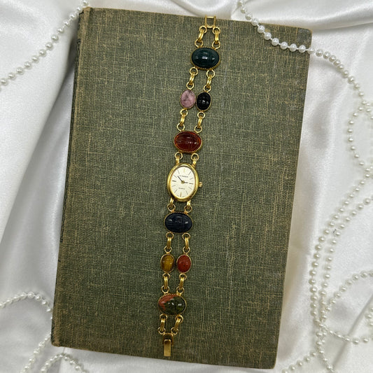 Vintage gold tone scarab watch with quartz movement