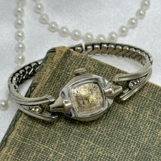 Vintage silver 10k rolled gold-plated&nbsp;Bulova manual winding cocktail watch with gorgeous crystal stretchable band.