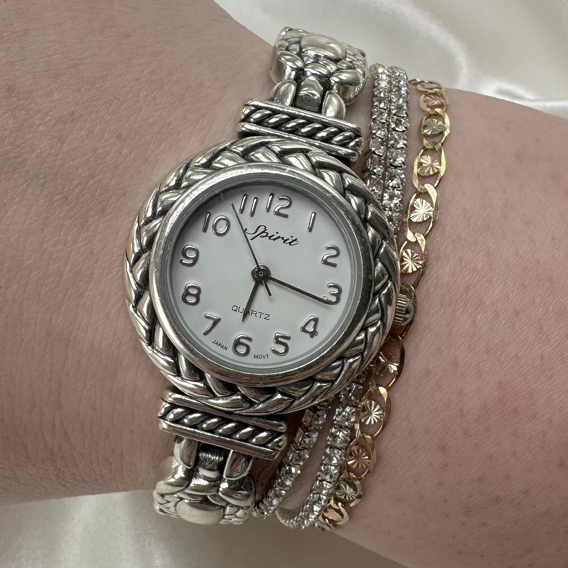 Vintage silver Spirit round dial watch with quartz movement