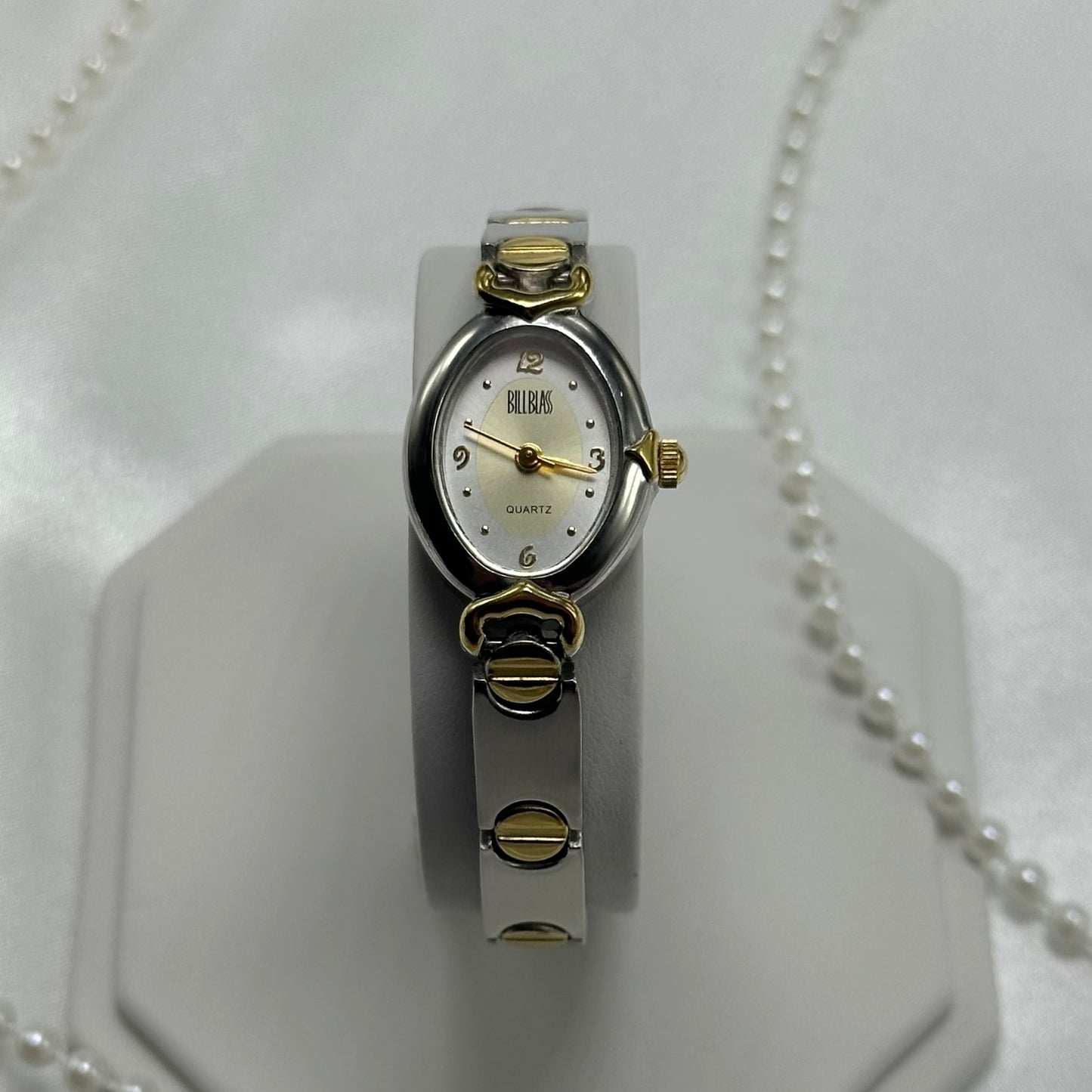 Vintage silver and gold tone Bliss Blass watch with quartz movement