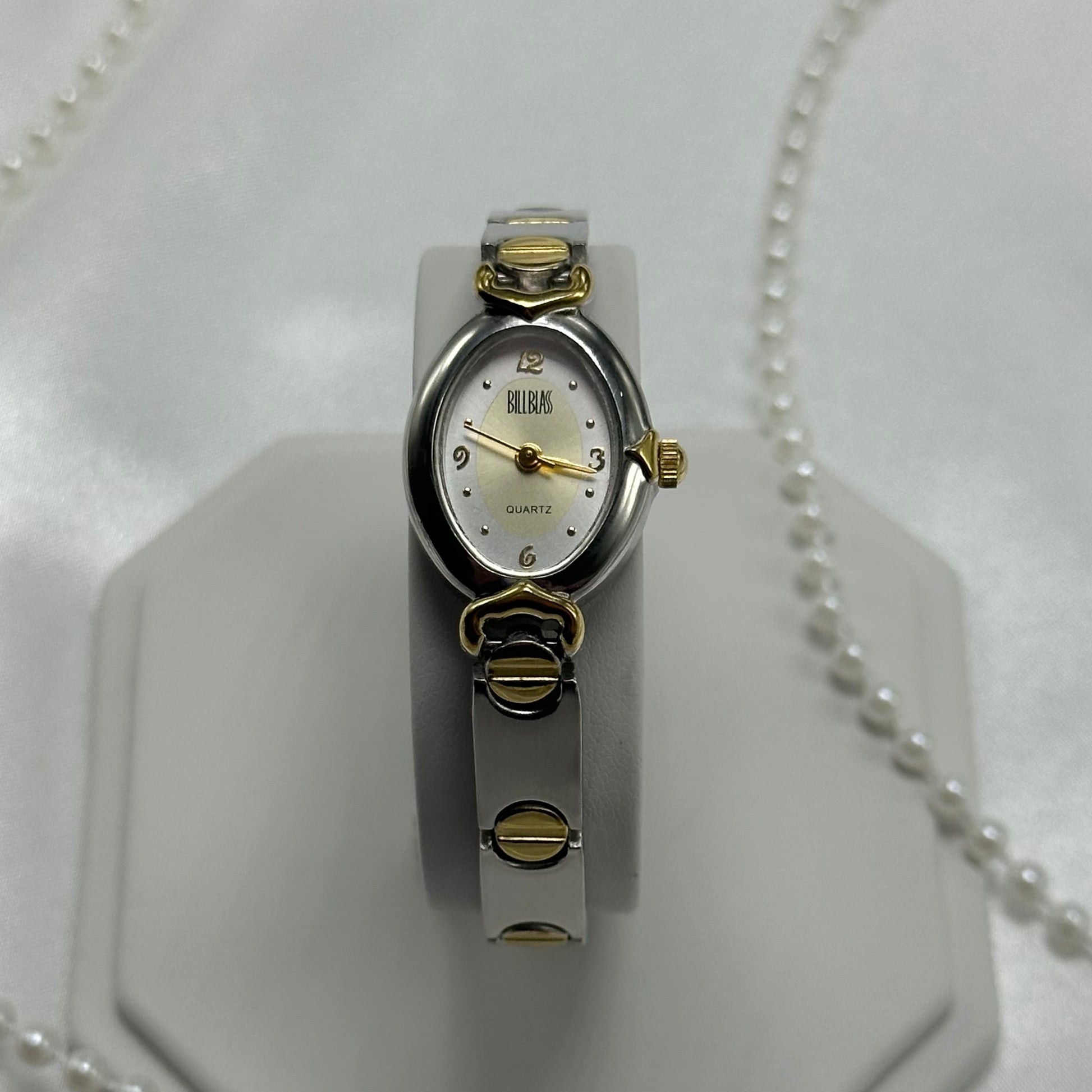 Vintage silver and gold tone Bliss Blass watch with quartz movement