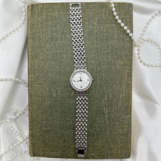 Vintage silver diamanté Daisy Fuentes round dial watch 