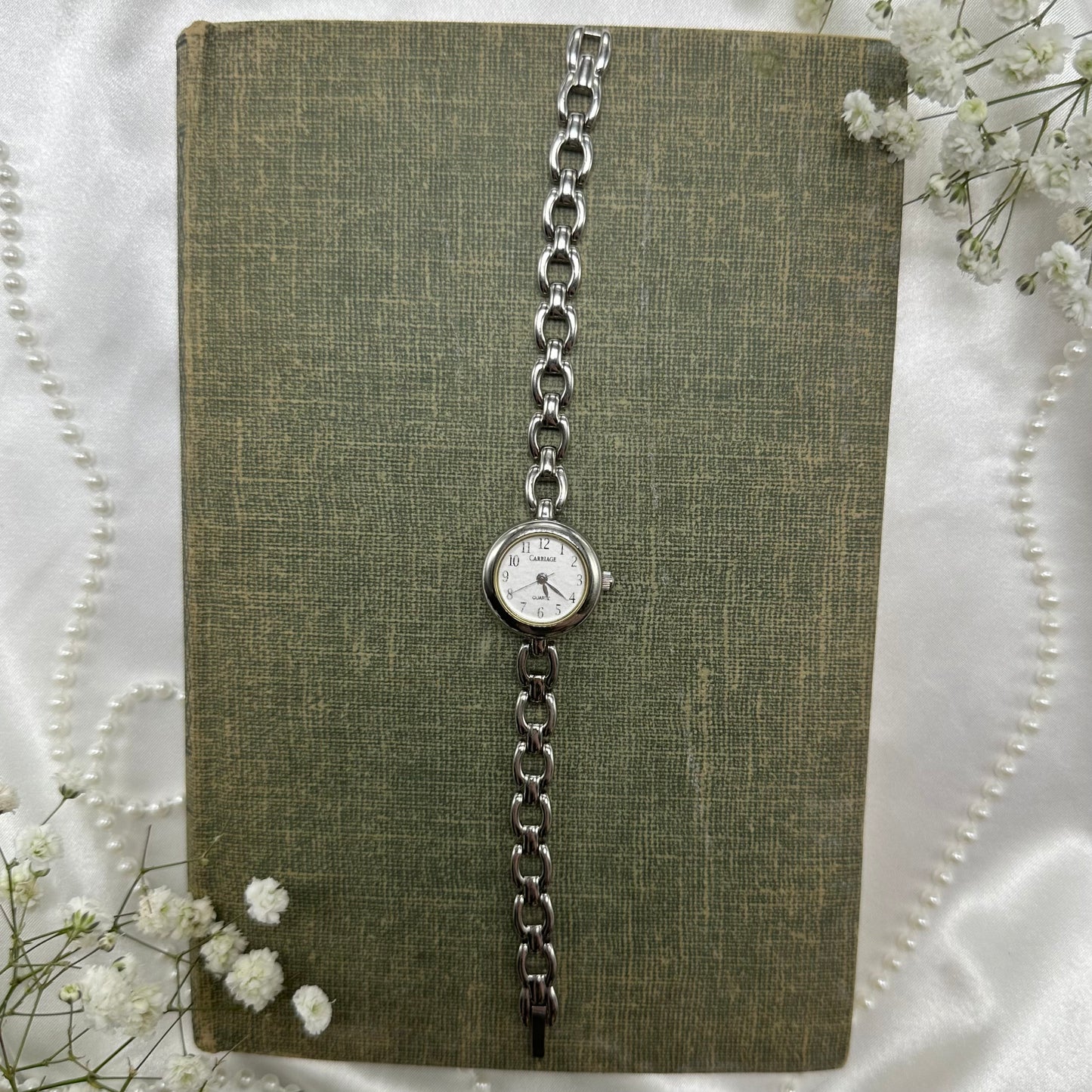 Vintage silver tone Carriage watch with quartz movement.