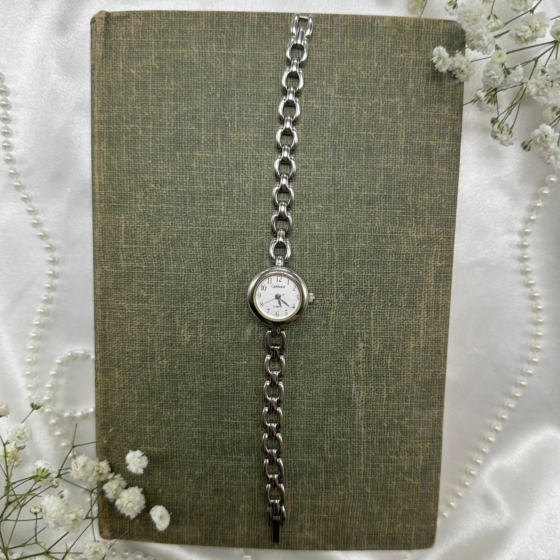 Vintage silver tone Carriage watch with quartz movement.