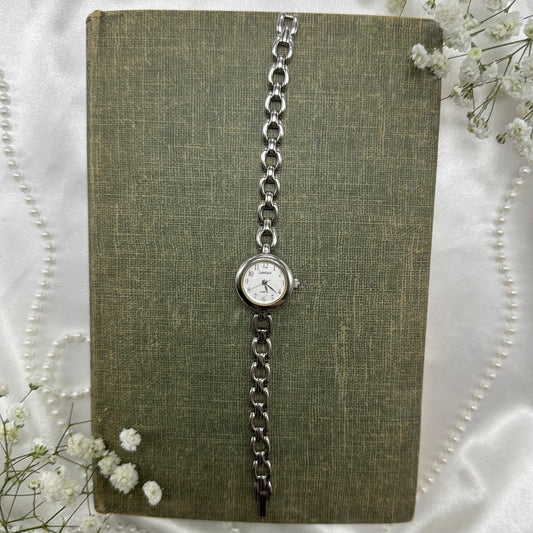 Vintage silver tone Carriage watch with quartz movement.