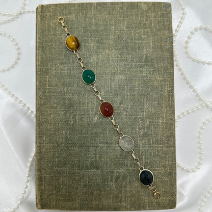 Vintage silver tone bracelet with multicolor scarabs.