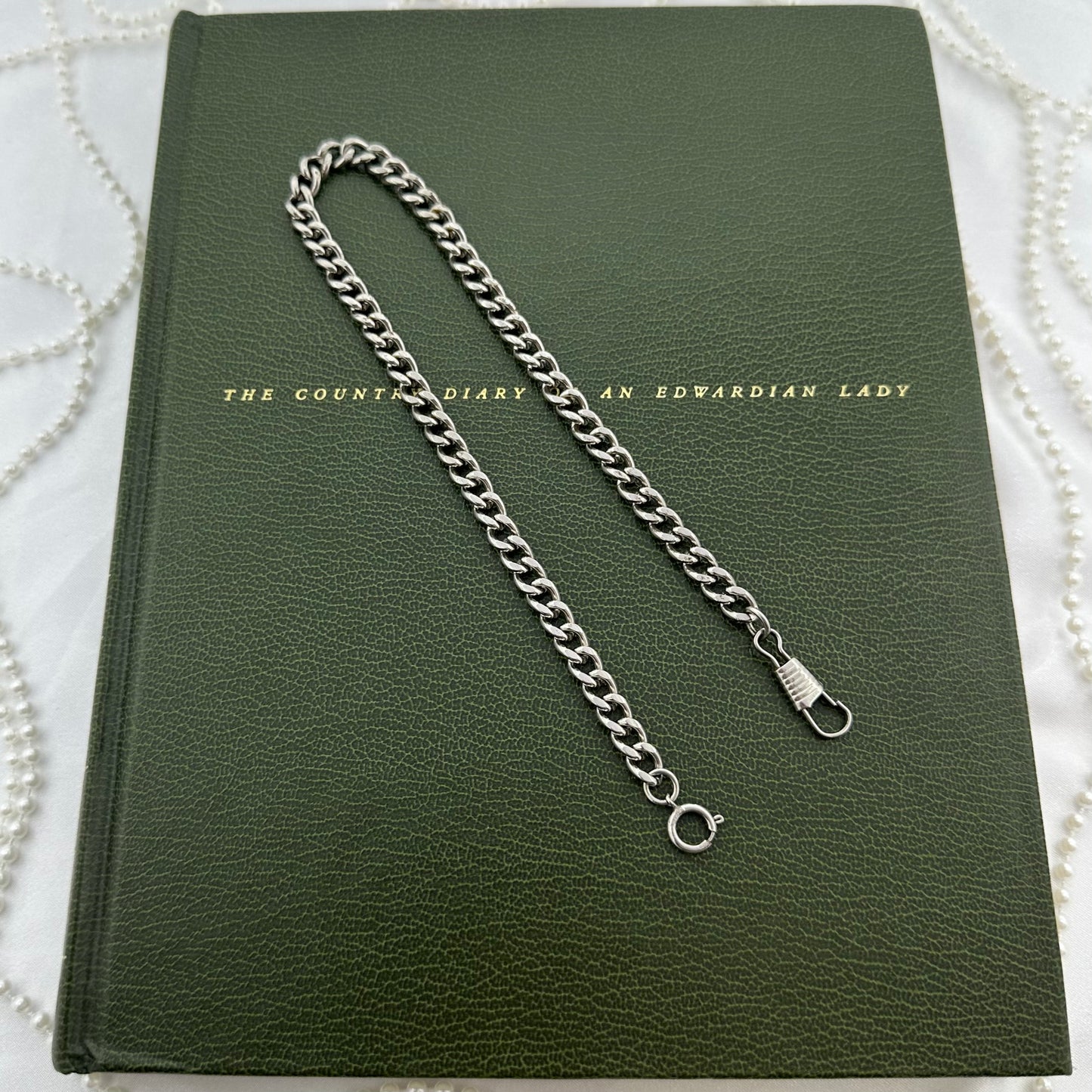 Vintage silver tone chunky curb watch chain with dog clip clasp.