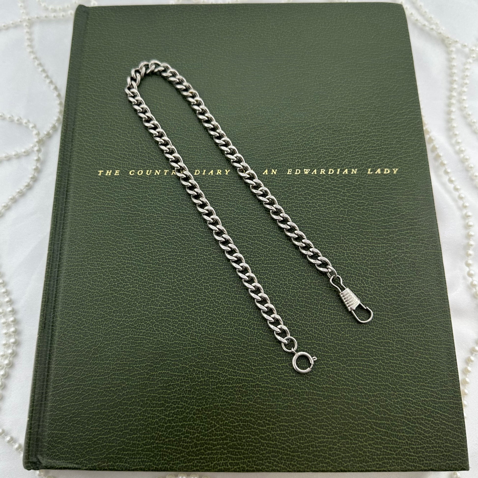 Vintage silver tone chunky curb watch chain with dog clip clasp.