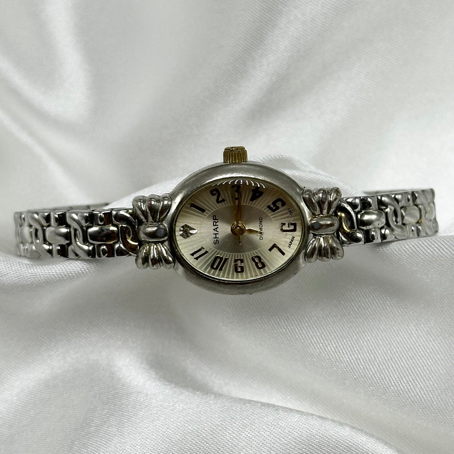 Vintage two-tone Sharp Diamond watch