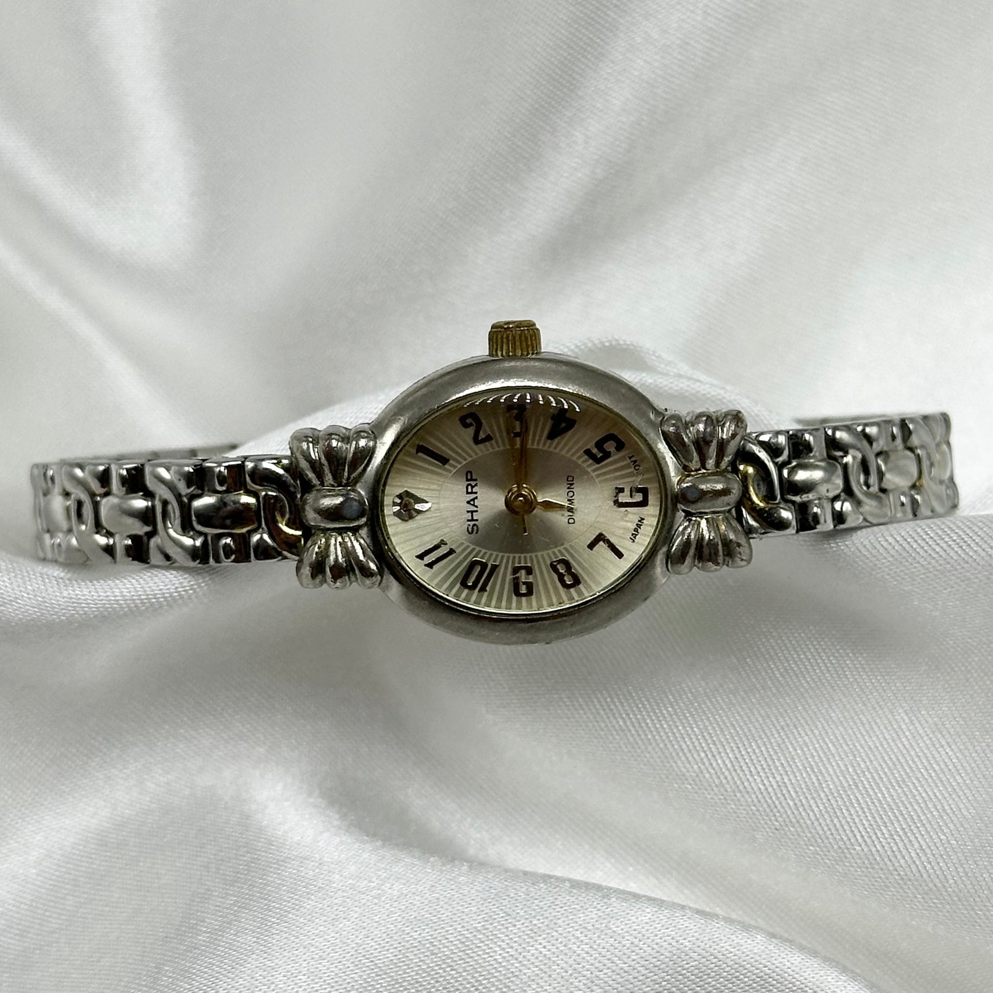 Vintage two-tone Sharp Diamond watch
