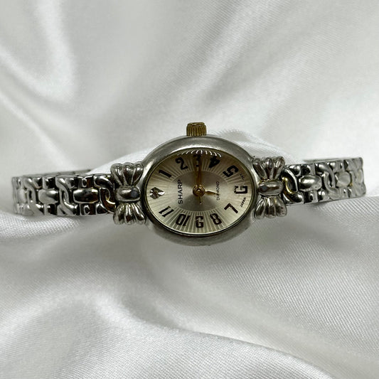 Vintage two-tone Sharp Diamond watch