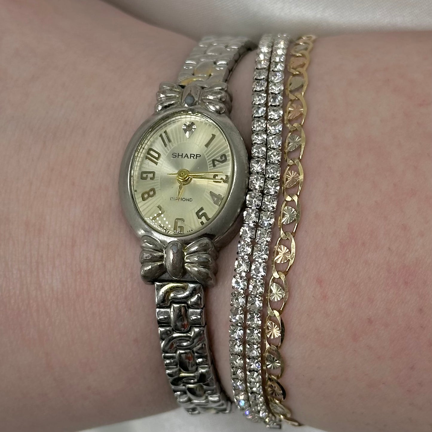Vintage two-tone Sharp Diamond women's watch