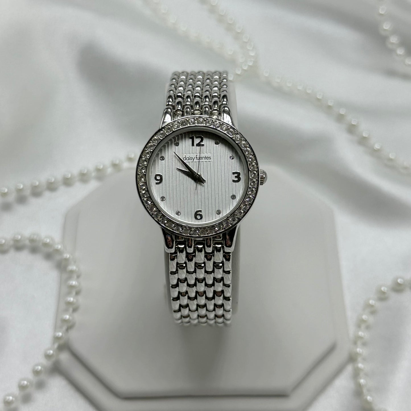 silver diamanté Daisy Fuentes round dial watch 