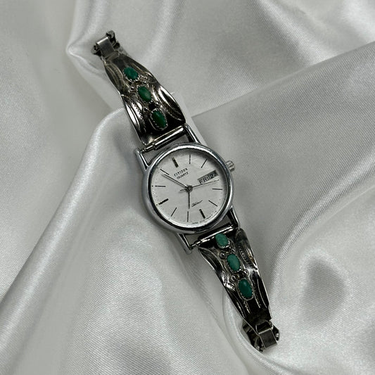 silver tone and turquoise Citizen Homer watch with quartz movement